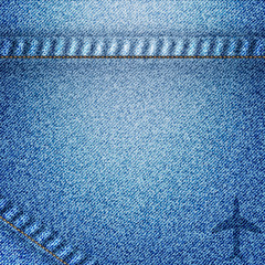 Airplane icon on jean background