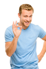 Happy man giving okay sign - portrait on white background