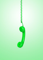 Green telephone cable hanging