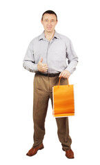 Man with paper package for purchases