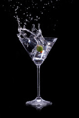 martini drink over dark background