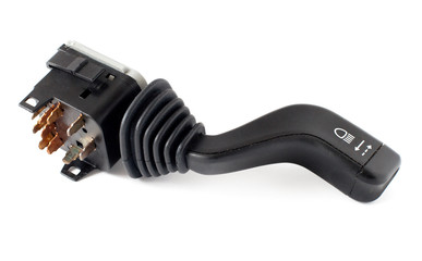 switch mounted on the steering column in a car on white