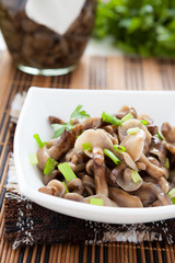Marinated mushrooms with chives