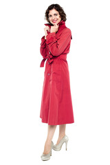 Pretty model in trendy outfit, full length portrait