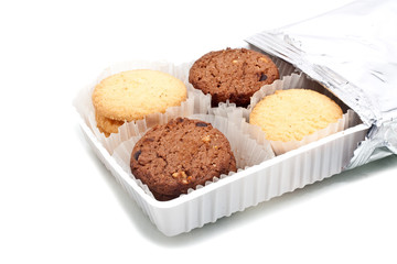 Assorted cookie in plastic box, isolated on white