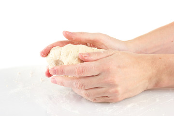 Preparing pizza dough isolated on white