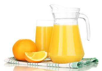 Full glass and jug of orange juice and oranges isolated on