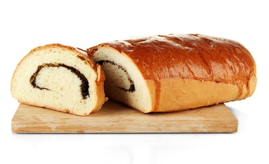Loaf with poppy seeds on cutting board, isolated on white
