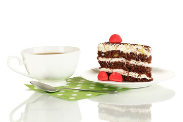 A cup of tea and delicious cake isolated on white