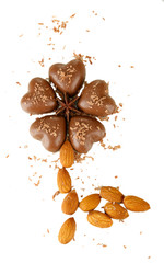 Chocolate hearts, almonds isolated on white