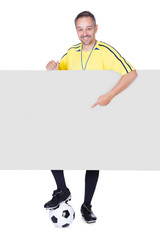 Happy Coach Holding Placard And Football