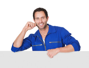 Portrait of happy automechanic