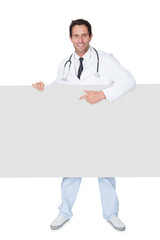 Doctor presenting empty banner