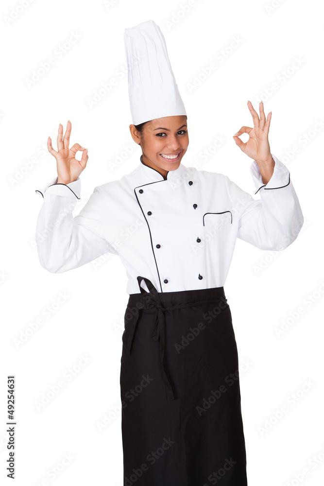 Wall mural Female Chef Showing Ok Sign