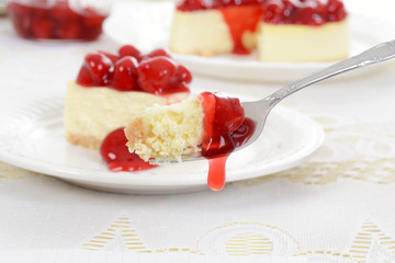 Macro cherry cheesecake on a fork