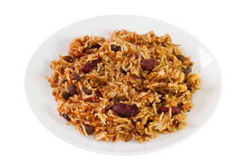 beans with meat and rice in the plate