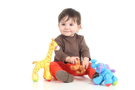 Baby playing with colorful toys