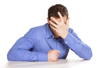 Obraz premium embarrassing man covers his face by hand