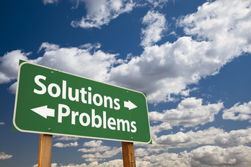 Solutions, Problems Green Road Sign Over Clouds