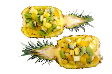 vitamin healthy fruit mix in pineapple bowl