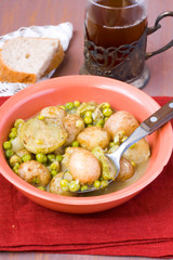 Baby potato, courgette and pea stew