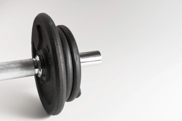 Dumbbell detail on white background