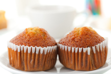 Pieces of banana  cake and coffee cup