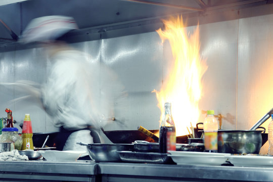 motion chefs of a restaurant kitchen
