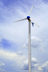 Wind turbines in blue sky
