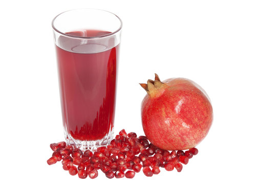 pomegranate  and pomegranate juice on a white background
