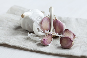 Garlic cloves on fabric