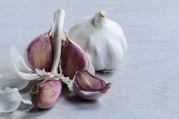 Garlic cloves on surface