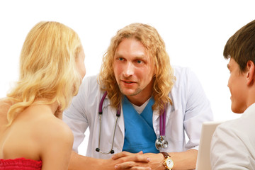 Young couple consulting with doctor isolated on white background