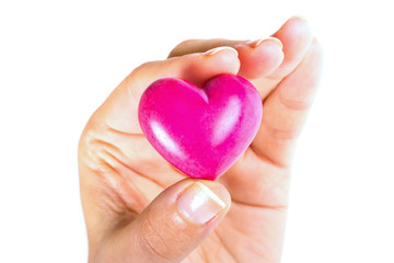 Heart in hand as love and health symbol