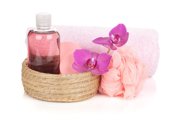 Obraz na płótnie Canvas Kosmetyki, ręczniki i kwiaty orchidei