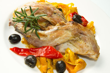Baked rabbit with olives and pepper