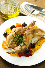 Baked rabbit with olives and pepper