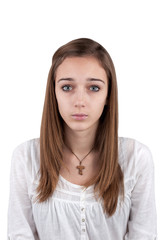 Fototapeta premium Portrait of a young teenage girl isolated on white