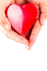 Obraz premium Kształt serca w ręce jako symbol miłości