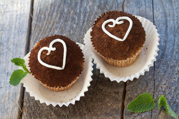 Couple of close-up cupcakes with Hearts