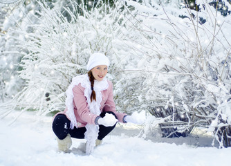 pregnant woman in snow park