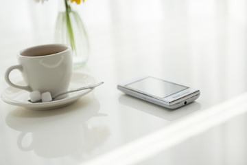 コーヒーとスマートフォン