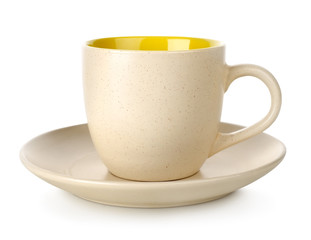 Yellow cup and saucer