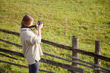 Female photographer shooting in open air