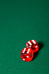Two dices on the poker table