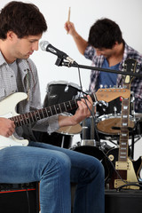 Fototapeta premium Rock group rehearsing