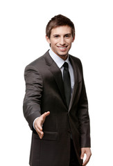 Friendly man giving hand for a handshake to seal the agreement