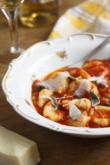 Potato gnocchi with tomato sauce and sage