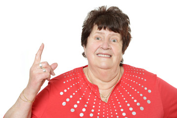 Seniorin mit erhobenem Zeigefinger