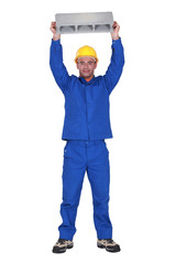 Building raising block over head